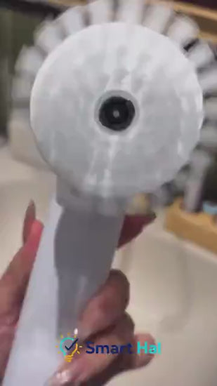Rechargeable electric scrubber cleaning a kitchen sink