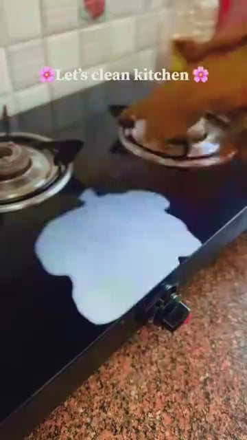 Foldable mini mop cleaning a kitchen surface