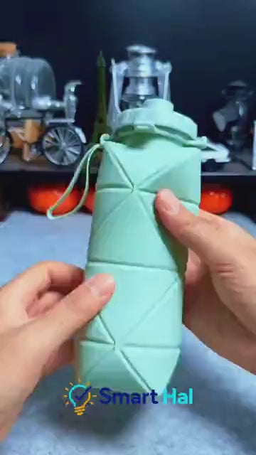 Collapsible silicone water bottle folding and expanding demonstration