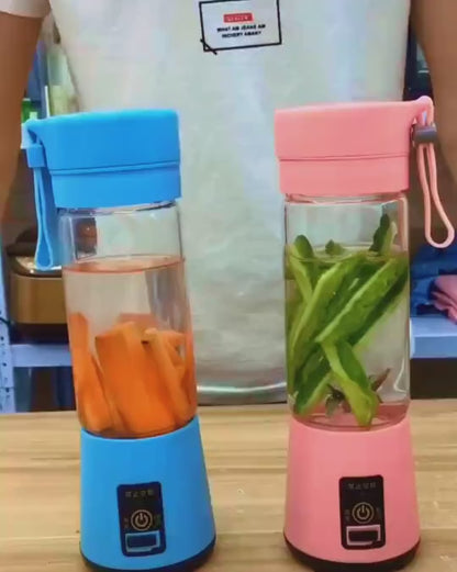 Portable blender making a fresh fruit smoothie