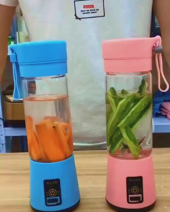 Portable blender making a fresh fruit smoothie