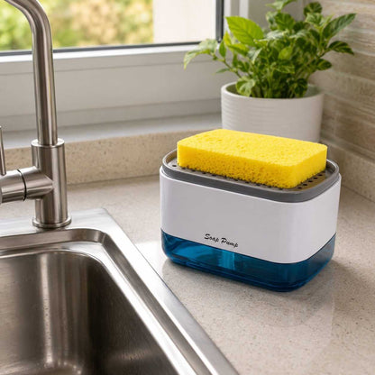 2-in-1 soap pump dispenser and sponge caddy placed near a kitchen sink faucet